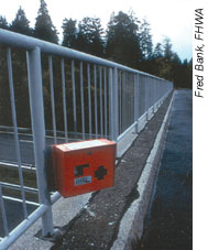 Photo of infrared still camera mounted on a Slovenian bridge