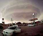 A supercell thunderstorm with rotating updraft makes a perfect backdrop for a mobile mesonet during the STEPS project.