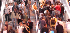 commuters crowding a staircase