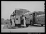 Mamie Fairchild and Dorothy Mason working on a bus at the City Transit Company, Beaumont, Tex.