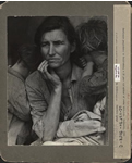Destitute peapickers in California [mother with two children on either side of her, children's backs to camera, mother's thumb grasping tent flap]
