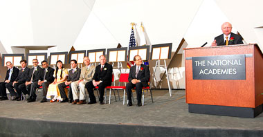 Secretary of Energy Samuel W. Bodman (at podium) presented eight researchers with the 2006 Ernest Orlando Lawrence Award in a ceremony at the National Academy of Sciences.