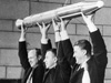 The three men responsible for Explorer 1, America's first Earth satellite, from left to right are William H. Pickering, James A. van Allen and Wernher von Braun.