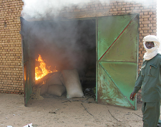 A government soldier who began burning the food storage of the villagers in Marla.