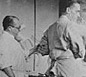 Carl Clauberg (far left), a research gynecologist, conducted cruel experiments at Auschwitz mostly on Jewish prisoners in 1943–44, aiming to develop an inexpensive method of mass sterilization.