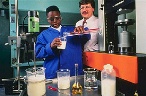 photo of student and scientist in laboratory
