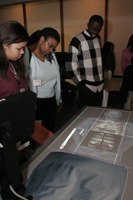 Young people touring the exhibition