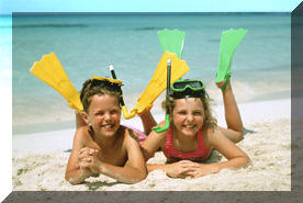 Two children relax after swimming