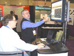 Terry Aho demonstrates an NRCS on-line soils tool to an American Planners Association attendee