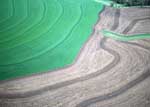 Aerial view on contour terraces and grassed waterways for erosion control (NRCS photo by Jeff Vanuga) 