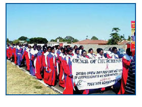 A Catholic group participates in a march as part
of the PEPFAR-supported Care and
Compassion Movement.