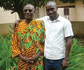 Counselor Kevin Kouassi, right, says antiretroviral treatment and his father’s support saved his life. Photo by Côte d’Ivoire PEPFAR Team