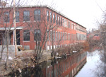 historic mill on the Woonasquatucket River