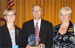 (from left) Nebraska’s Federal Women Special Emphasis Program Manager Stacy Modelski, Nebraska NRCS State Conservationist Steve Chick and FEW Mid-Continent Regional Manager Joan Chopp (NRCS photo -- click to enlarge)