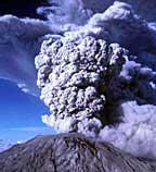 A large ash plume erupts from a volcano