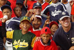 Photo of local baseball players and SOUTHCOM All-Stars posing for a photo after completing a successful clinic in Panama.