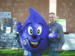 NRCS Arizona assistant public affairs specialist George Couch poses with the Scottsdale Water Drop at the Arizona Water Expo held last month