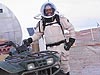 LaTasha Taylor stands beside a rover at the Mars Society's Mars Desert Research Station as part of Spaceward Bound