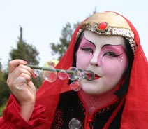 picture of performer blowing bubbles