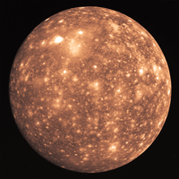This image shows the heavily cratered surface of Callisto. It was taken by Voyager 2 on July 7, 1979. An enormous impact basin with concentric rings is located near the top and slightly left of center.