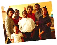 Image of a family with grandparents parents and children