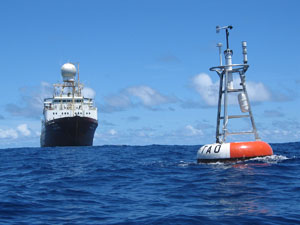 A TAO moored buoy with a ship in the background