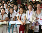 During her visit to the Mae La Refugee Camp in Mae Sot, Thailand, Aug. 7, 2008, Mrs. Laura Bush visits with a class studying grammar. [White House photo by Shealah Craighead]