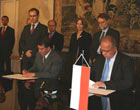 Arms Control/International Security Under Secretary John Rood-L- and Polish Under-secretary of State Andrzej Kremer initial a missile defense agreement, Aug. 14, 2008. Photo: U.S. Embassy Warsaw.