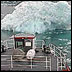 a cutter slices through sea ice.