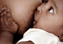 photo close-up of baby on breast