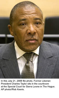 Liberian President Charles Taylor shown seated at the courtroom of the Special Court for Sierra Leone AP photo, July 21, 2006