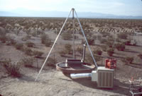 The top of the access shaft after installation. Instrumentation to measure the movement of moisture in the unsaturated zone radiate away from the shaft