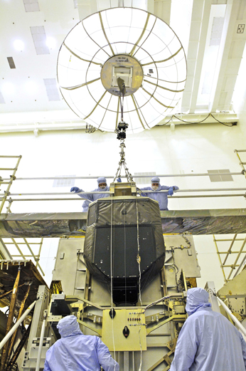 Hubble's refurbished Fine Guidance Sensor is installed into its protective enclosure at KSC