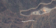 A seamless zoom from space to the ground, using data from Terra-MODIS, Landsat-ETM+, and IKONOS, and ending at the Hollywood Sign in Los Angeles, California.