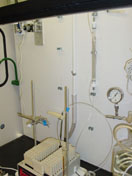 Laboratory equipment used for soil-column experiments on the transport of emerging contaminants through soil