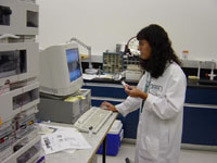 USGS scientist operating a liquid chromatography/mass spectrometry (LC/MS) instrument used to measure emerging contaminants in wate