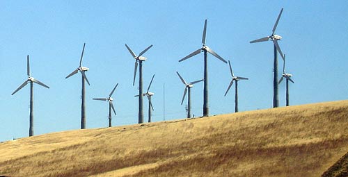 wind farm turbines on hill