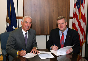 L-R James Malvaso, President, ITA and OSHA's Assistant Secretary, Edwin G. Foulke, Jr. sign a national Alliance renewal agreement on April 24, 2006