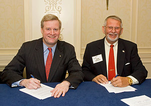(L to R) Edwin G. Foulke, Jr., Assistant Secretary, USDOL-OSHA; and Stanley J. Simpson, President, Industrial Truck Association and President and CEO of Kalmar RT; sign a national Alliance renewal agreement on April 9, 2008