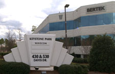 The building’s Davis Drive entrance is clearly marked. The Hobson Road entrance marker is similar to the one on Davis.