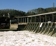 image of dam spilling water
