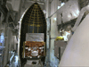 GLAST spacecraft enclosed in rocket fairing.