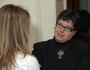 The meeting gave trainees, including NIH Chair of the NIH Visiting Fellows Committee Elizabeth Rex, Ph.D., left, an opportunity to network with successful Latina scientists, such as Cauce.