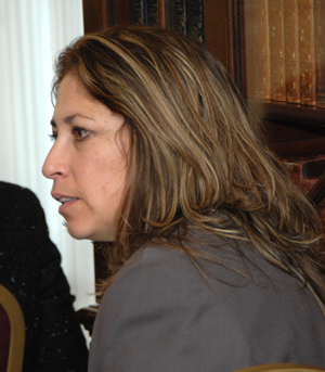 Maria Celina Conte, a specialist with the Organization of American States Office of Science and Technology, talked with another participant as the next speaker set up her microphone.