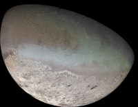 Global color mosaic of Triton, taken in 1989 by Voyager 2 during its flyby of the Neptune system. Color was synthesized by combining high-resolution images taken through orange, violet, and ultraviolet filters; these images were displayed as red, green, and blue images and combined to create this color version.