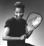 Photo of a woman and a tennis racket