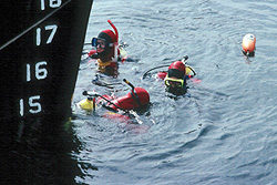 3 Divers at a Bow