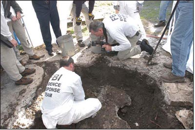 Photograph of the F B I's Evidence Response Team at work