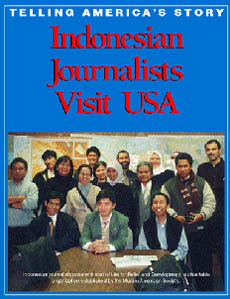 booklet cover shows group photo of journalists