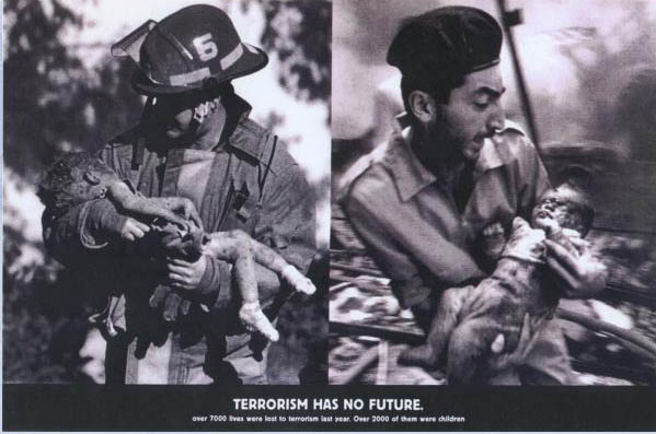 shows two men of different cultures, each holding a child horribly injured by terrorist bomb